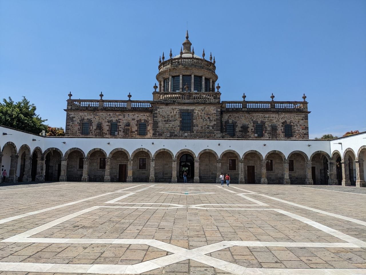 Courtyard of the Hospicio Cabañas with colonnaded galleries and central domed chapel in Guadalajara
