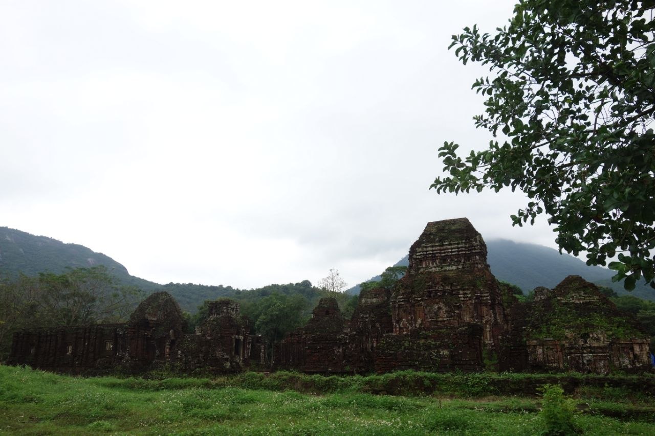 Mỹ Sơn Sanctuary Cham tower ruins surrounded by mist and forested hills