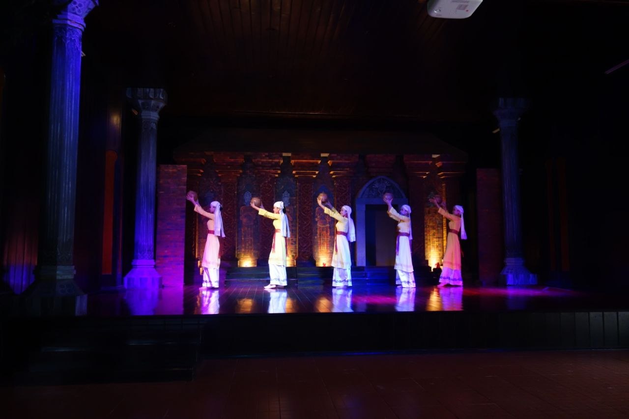 Traditional Cham dance performance on stage near Mỹ Sơn Sanctuary